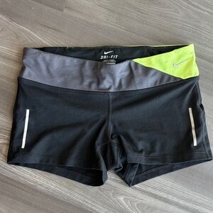 Nike Women's Black and Gray Athletic Shorts with Neon Accent